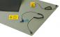 Preview: The image shows a green ESD work mat. Attached to the mat are a yellow safety symbol, a blue grounding clip, and a cable with a plug.