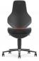 Preview: The chair has a modern, ergonomic shape with a high backrest. It stands on a five-rayed, swivel base. An orange accent is visible in the middle of the backrest.