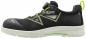 Preview: The shoe is black with bright green accents. It has a sporty design, a closed toe area, and a bright, non-slip sole. The closure is via a twist system.