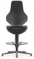 Preview: The image shows a modern office chair with a high backrest, black upholstery, and a gray frame. An orange accent runs horizontally in the middle. The chair has a footrest.
