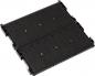 Preview: The image shows a rectangular, black plastic plate with many parallel grooves. It has small hooks or tabs on the edges and appears sturdy and flat.