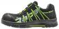 Preview: The shoe is designed sportily, in black with bright green accents. It features a reinforced toe cap and a breezy, breathable surface. The laces are replaced by a practical closure.