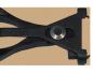 Preview: The image shows a black tool with two long, curved handles connected to a sturdy plate with a round metal axis. It has a central opening.