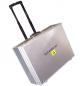 Preview: The picture shows a silver suitcase with a telescopic handle, standing on wheels. On the front, the inscription "ESD-AUDIT-KIT" is visible.