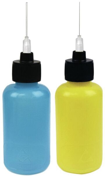 It is a transparent, blue plastic bottle with a black lid. On top, there is a narrow, long spray nozzle attachment.
