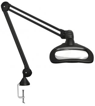 The image shows a black magnifying lamp with a long, flexible arm. It is attached to a table and has a large, oval lens for magnifying objects.