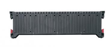 The image shows a long, rectangular, black container. The surface is ribbed and has red reflectors at the ends. The container is sturdy and has an industrial aesthetic.