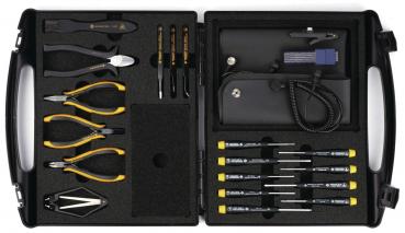 The image shows a toolbox with two flaps. Inside, various tools such as pliers, screwdrivers, and tweezers are neatly arranged, with yellow and black handles.