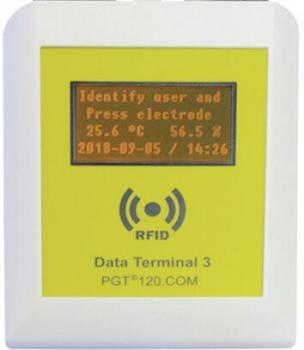 The image shows a rectangular device with a yellow frame and a screen. The display shows information such as temperature, humidity, and a date/time stamp. An RFID symbol is visible.