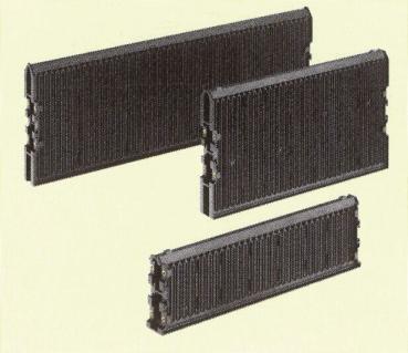 The image displays three differently sized rectangular elements in black, structured by vertical grooves. The elements are arranged side by side.