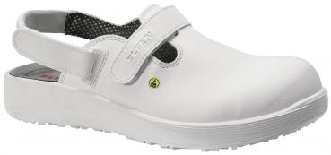 The image shows a modern white clog with an adjustable strap at the back. The sole is flat and non-slip. The inside has a textured, dark surface.