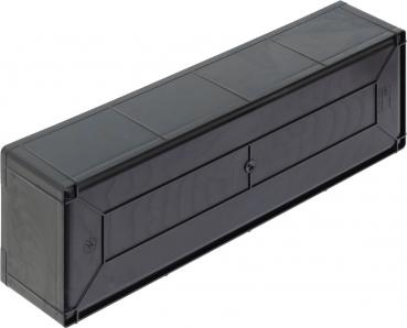 Das Bild zeigt eine rechteckige, durchsichtige schwarze Box mit einem abgerundeten Deckel. Sie hat eine glatte Oberfläche und Öffnungen auf der Oberseite, um den Inhalt zu entnehmen.