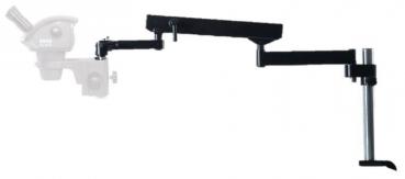 The image shows a black mount with multiple arms that can support a device. It is attached to a sturdy base and allows for flexible positioning.