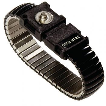 The image shows a metal bracelet with a flexible link structure. It has a black clasp marked "OPEN HERE" that is easy to open.