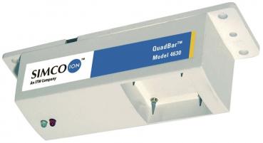 The image shows an elongated, gray device with a blue label. It has two small LED lights in different colors and is intended for wall mounting.