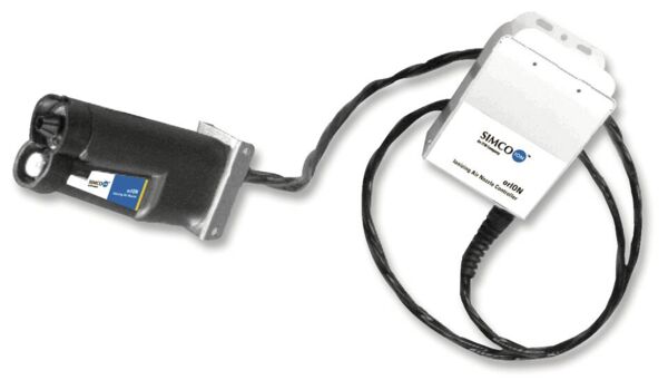 The image displays a technical device featuring a long, black handle and a connecting cable. At one end, there is a block marked with the inscription 