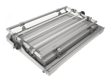 The image shows a flat, rectangular table with metallic elements and narrow grooves. It is foldable, making it portable and space-saving.