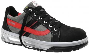 The shoe is a sporty, blue sneaker with gray laces. It has a light, thick sole and a blue line on the side. The upper material is made of denim and leather.