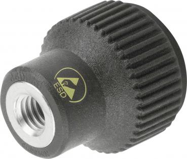 The image displays a round, black-gray ESD button with a ridged surface. In the center, there is a thread. A yellow symbol with the inscription "ESD" is visible.