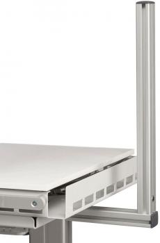 The image shows a modern desk with a white, smooth surface. On one side there is a vertical, gray metal profile that appears stable and robust.