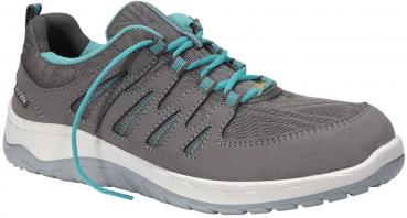 The shoe is gray with turquoise accents. It has a sporty, breathable upper and a flexible sole. The laces are turquoise and highly visible.