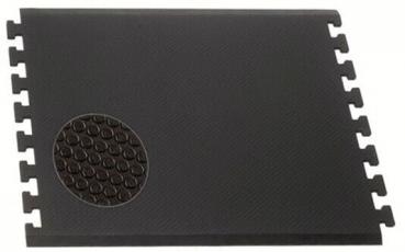 The image displays a black, rectangular mat with bumps in a circular area on one side. The mat features connectors at the edges to attach it to other mats.