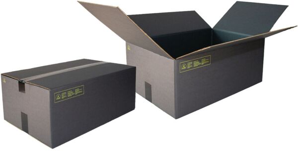 The image shows a large, dark cardboard box. It has a matte surface and is sealed with sturdy, gray duct tape. Yellow notices are printed on the side.