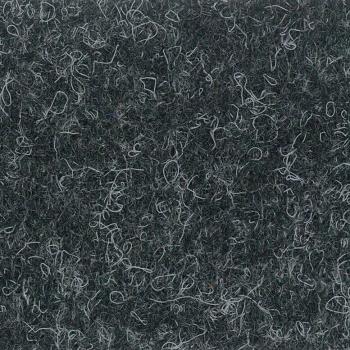 The image shows a dark, textured surface with fine, tangled, light threads or fibers that appear randomly distributed. The texture is soft and feels velvety.