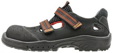 The shoe is a black sandal with a solid sole. It has a padded interior and two adjustable straps. The upper surface is partially perforated for better ventilation.