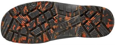 The image shows the sole of a shoe. It is predominantly black with a non-slip tread. Some areas are speckled orange, which provides grip. The structure is variable with different patterns.
