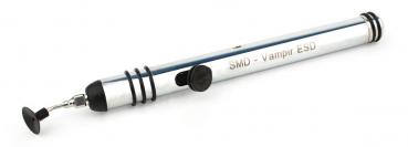 The image shows a silver SMD soldering iron with a rubberized handle. It has a pointed, metallic tip and a black rubber stopper. The body is labeled 