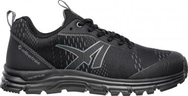 The shoe is a black, athletic running shoe with laces. It has a textured surface and a slightly reinforced sole that provides better grip.