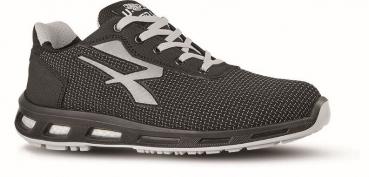 The shoe is a sleek, sporty sneaker in black with gray accents. It features a breathable upper and a flexible sole with cushioning elements.