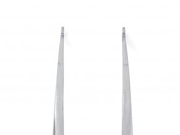 The image shows two long, straight, silver metal planks arranged parallel to each other. The ends are pointed. The background is light and inconspicuous.