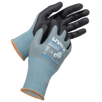 The image shows a pair of gloves. The gloves are gray with a black grip area and an orange edge on the cuff. They are designed for occupational safety.