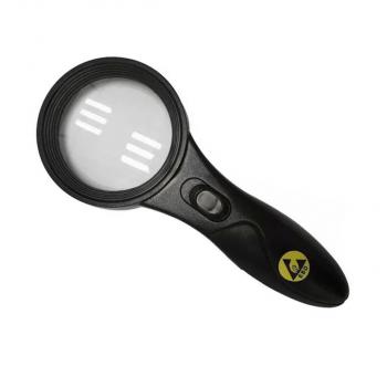 The image shows a black magnifying glass with an ergonomic handle. The lens is large and transparent, with a button in the middle to activate the lighting. Ideal for enlarging small texts.