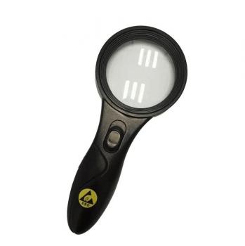 The image shows a black magnifying glass with a round lens and an ergonomic handle. There is a switch on the front to turn on the light.