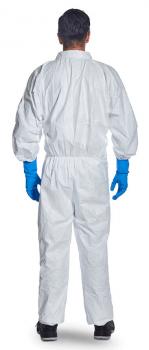The image shows a person from behind wearing a white protective suit and blue rubber gloves. The suit is loosely fitted, and the person is standing against a neutral background.
