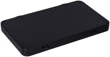 The image shows a flat, rectangular box in matte black. The edges are rounded, and there are two small recesses on the side. It appears simple and modern.