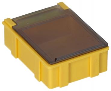 The image shows a small, square box in bright yellow. It has a transparent lid that is slightly rounded. The sides are smooth with some vertical grooves.