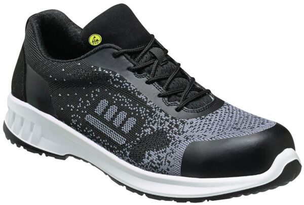 The shoe is sporty, light gray with a textured upper. It has a white, lightly padded sole and gray laces. The shape is slim and modern.