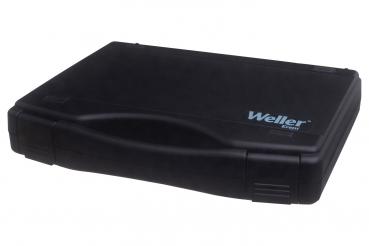 Das Bild zeigt eine schwarze, rechteckige Kofferform mit einem glänzenden Logo "Weller" auf der Oberseite. Der Koffer hat abgerundete Ecken und eine seitliche Griffmulde.