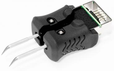 The image shows a black tool with a curved, rubberized surface and two long, thin tips used for gripping or holding objects.