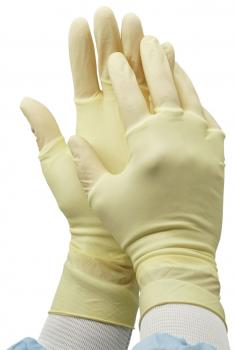 The image shows two hands wearing yellow disposable gloves. The hands are facing each other, ready to put on the gloves. The background is slightly blurred.