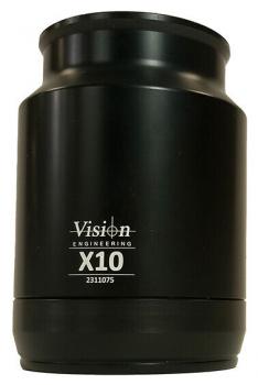 The image shows a cylindrical, black lens attachment labeled "Vision Engineering X10" with a serial number. The surface is smooth and shiny.