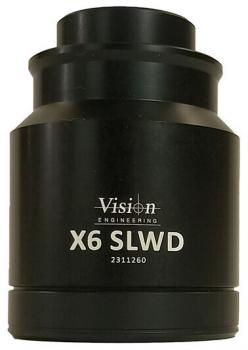 The image shows a black, cylindrical lens marked "Vision Engineering X6 SLWD" with a serial number below it. It has a wider upper part and tapers towards the bottom.