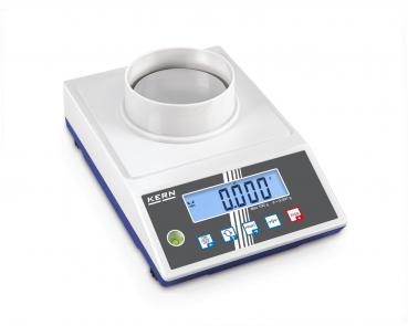 The image shows a digital laboratory scale with a round weighing platform in the middle and a large digital display. There are several buttons for operation.