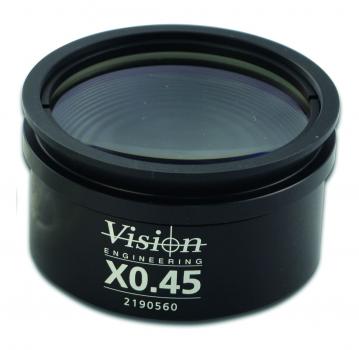 The image shows a round, black lens housing with a glass lens in the center. The housing reads "Vision Engineering X0.45" in white letters. The edge is slightly curved.