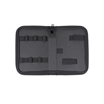 The image displays a black, open bag or portfolio. Inside, there are various loops and compartments, likely for holding pens or other utensils.