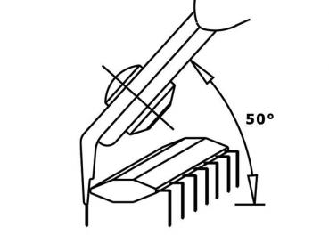 The image shows a schematic representation of tweezers pointing at an object at a 50-degree angle. The object has several parallel lines arranged on it.